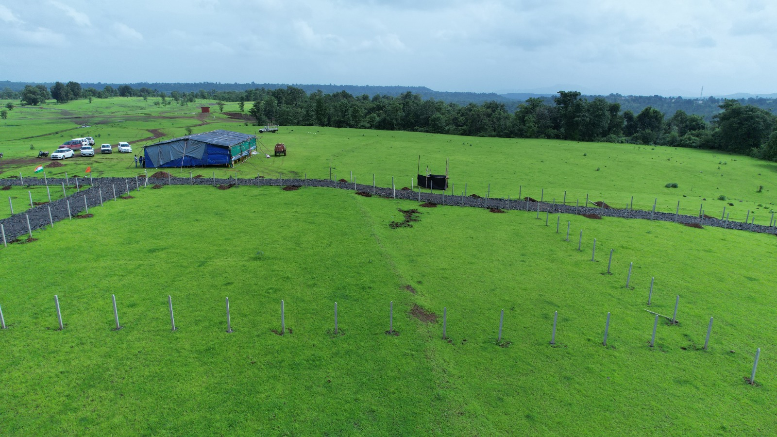 Actual aerial view of the green land and marked plot boundaries at Healthwell Diamond City
